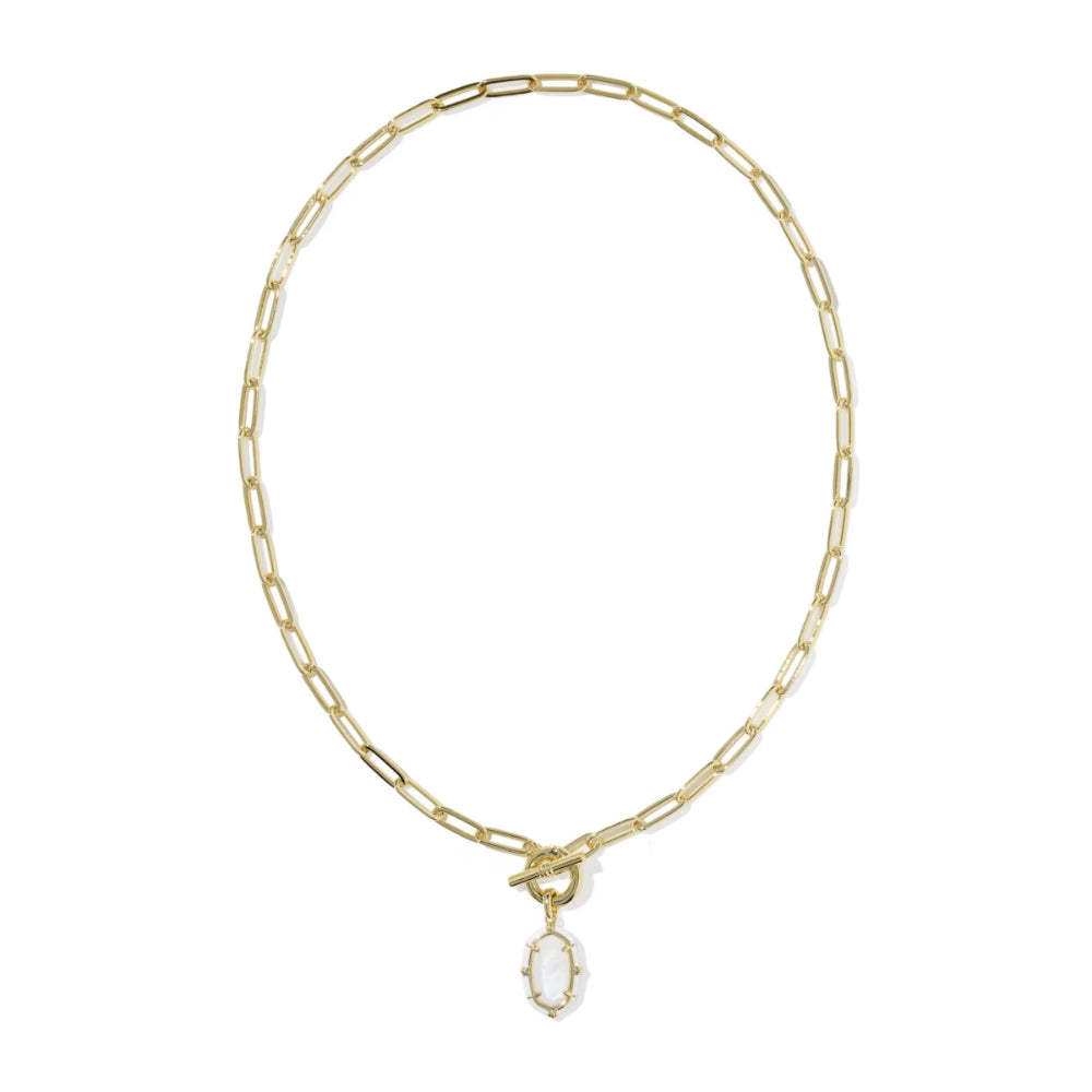 A gold paperclip chain necklace with a toggle clasp and a small oval white stone pendant, shown on a plain white background.