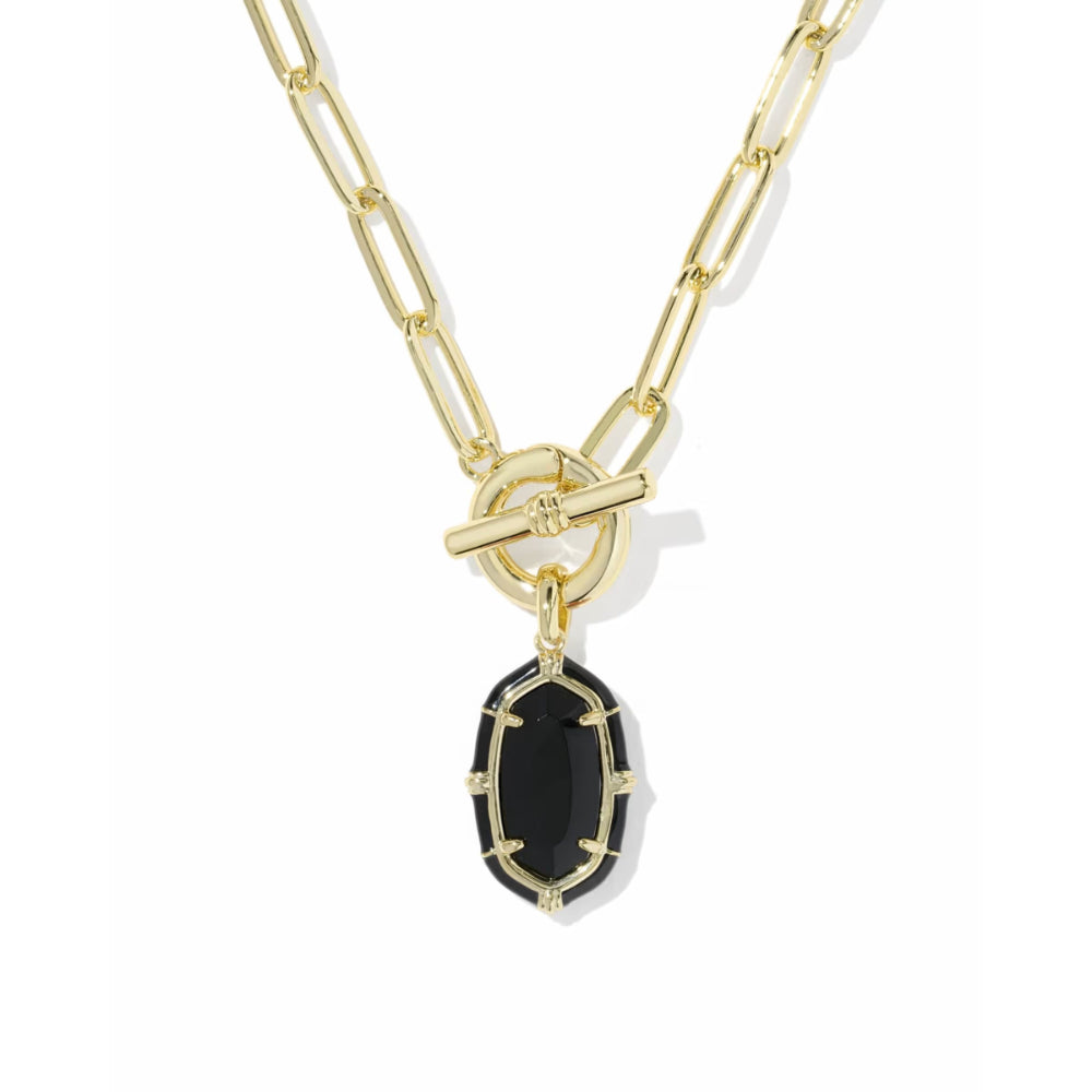 Silver necklace with a star-shaped pendant featuring a blue gemstone on a white background