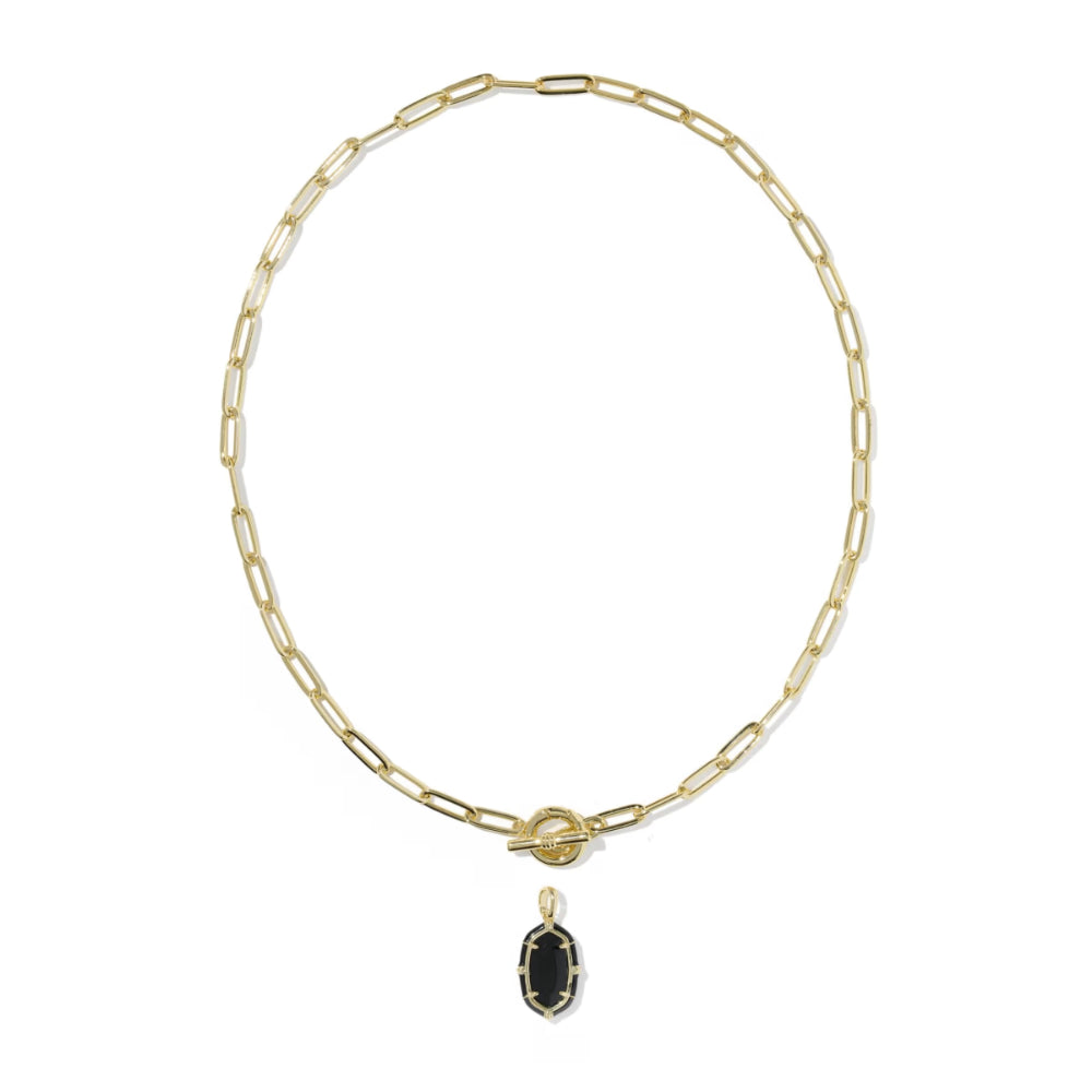 A gold paperclip chain necklace with a toggle clasp and a small oval black onyx pendant, shown on a plain white background.