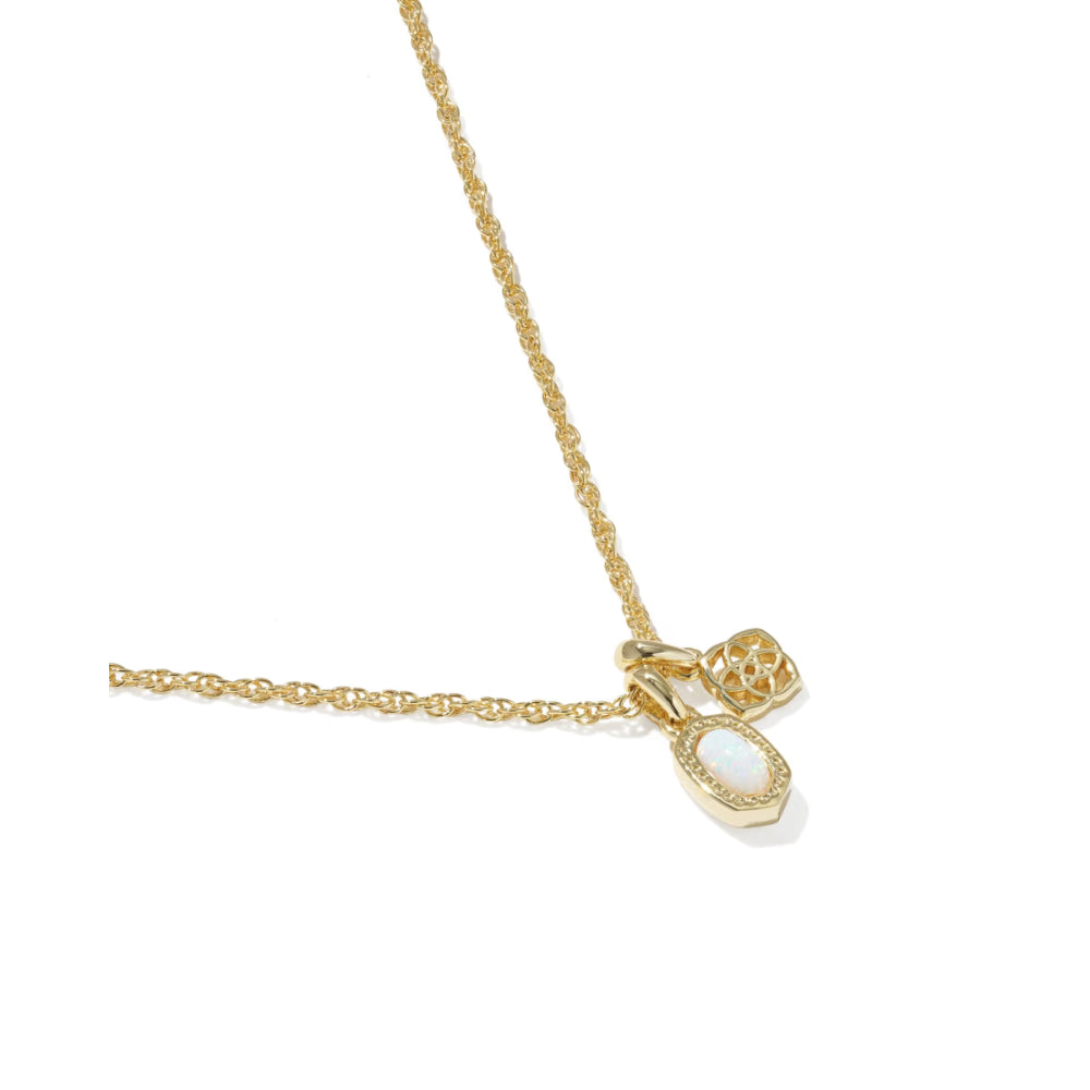 Gold necklace with a heart-shaped pendant on a white background