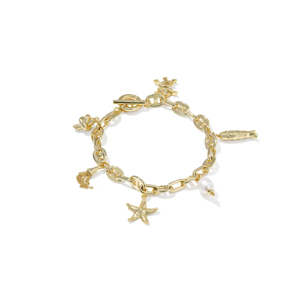 Gold charm bracelet with starfish and pearl designs on a white background