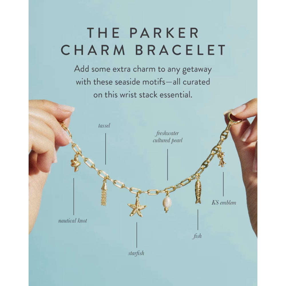 Parker Charm Bracelet with labeled charms on a light blue background