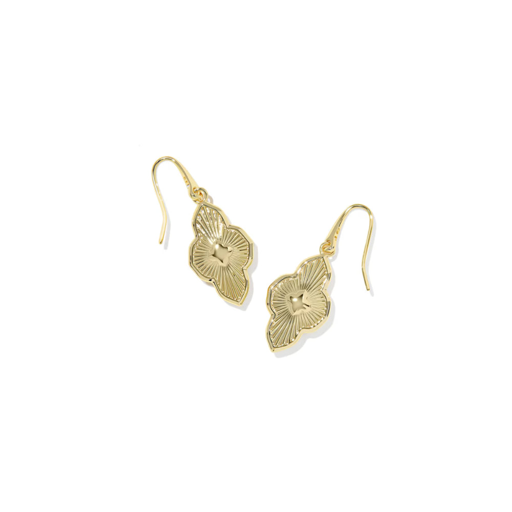 Gold earrings on a white background