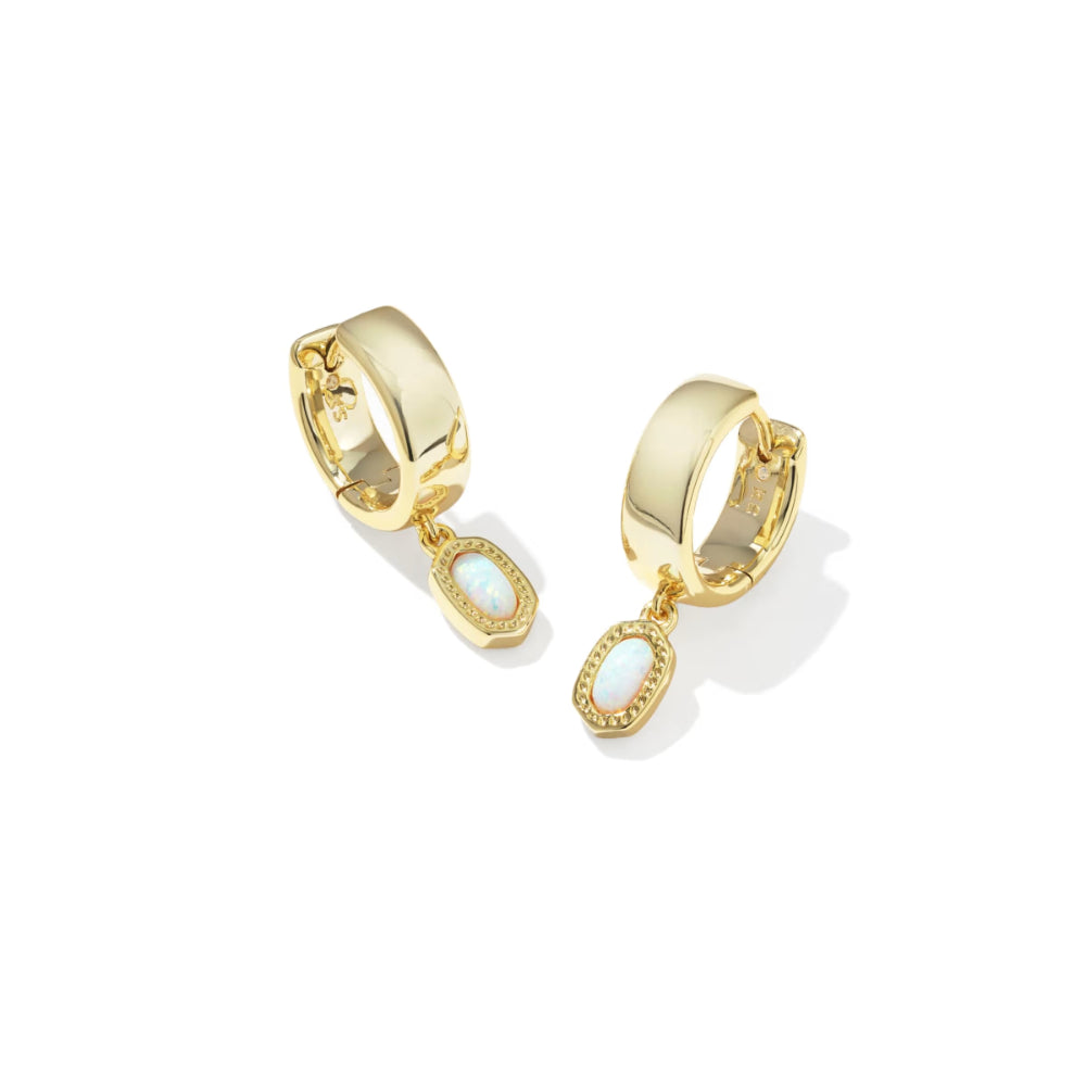 Gold hoop earrings with small dangling stones on a white background