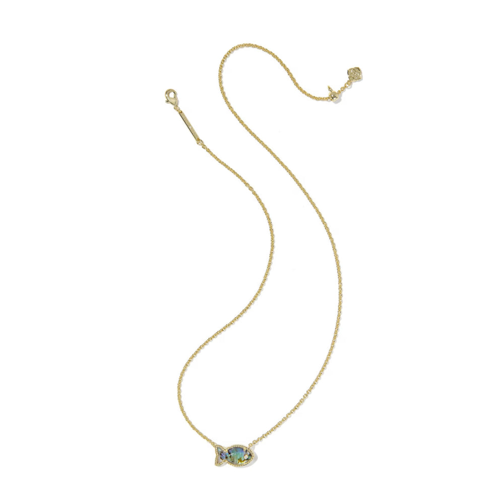 Gold necklace with a green gemstone pendant on a white background