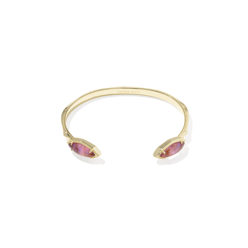 Gold bracelet with pink stones on a white background