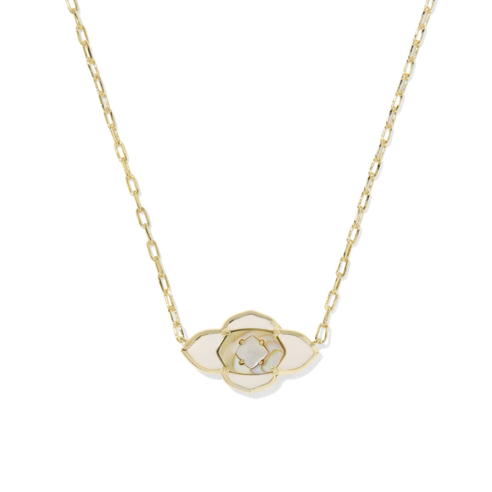 Necklace with a white flower pendant on a gold chain against a white background
