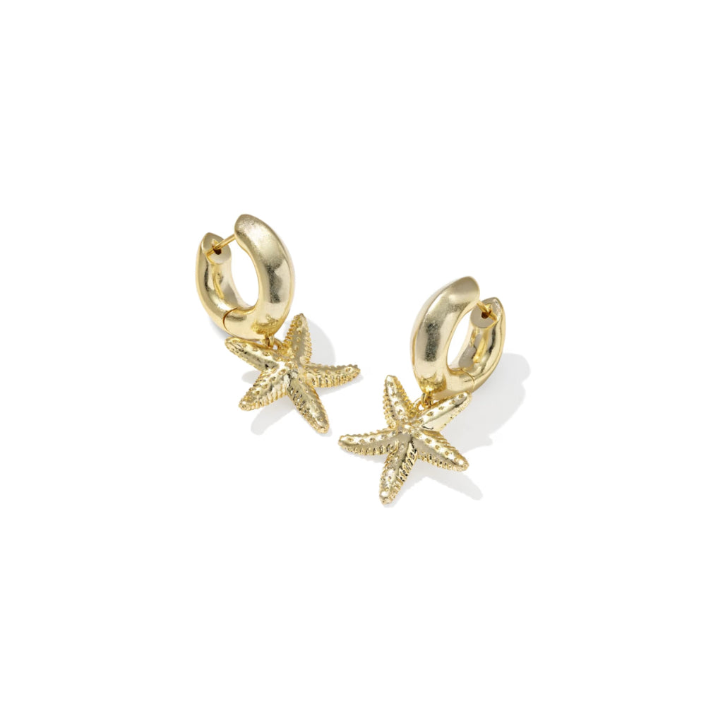 Gold hoop earrings with starfish charms on a white background