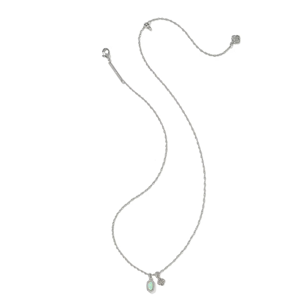 Gold necklace with a small pendant on a white background