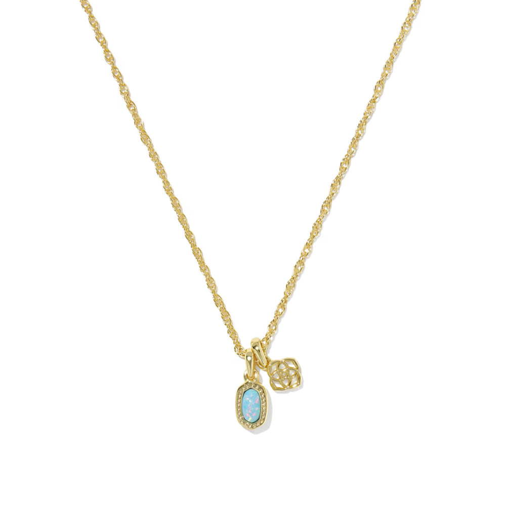 Gold necklace with a pendant featuring a blue gemstone on a white background