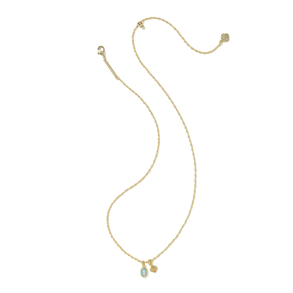 Gold necklace with a small pendant on a white background