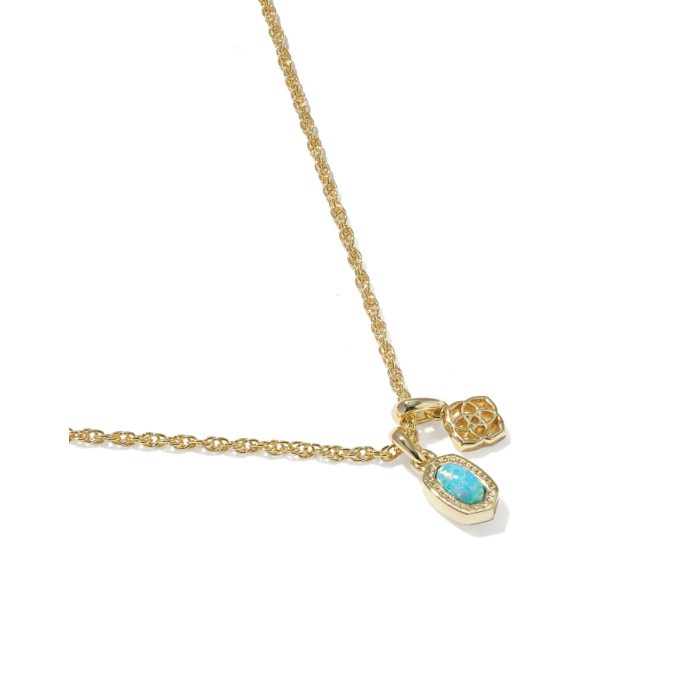 Gold necklace with a turquoise pendant on a white background