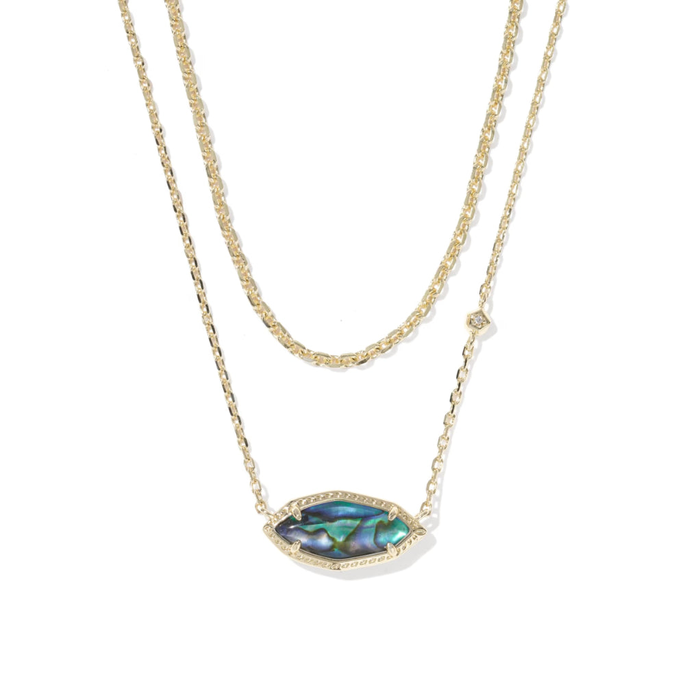 Necklace with a green gemstone pendant on a white background