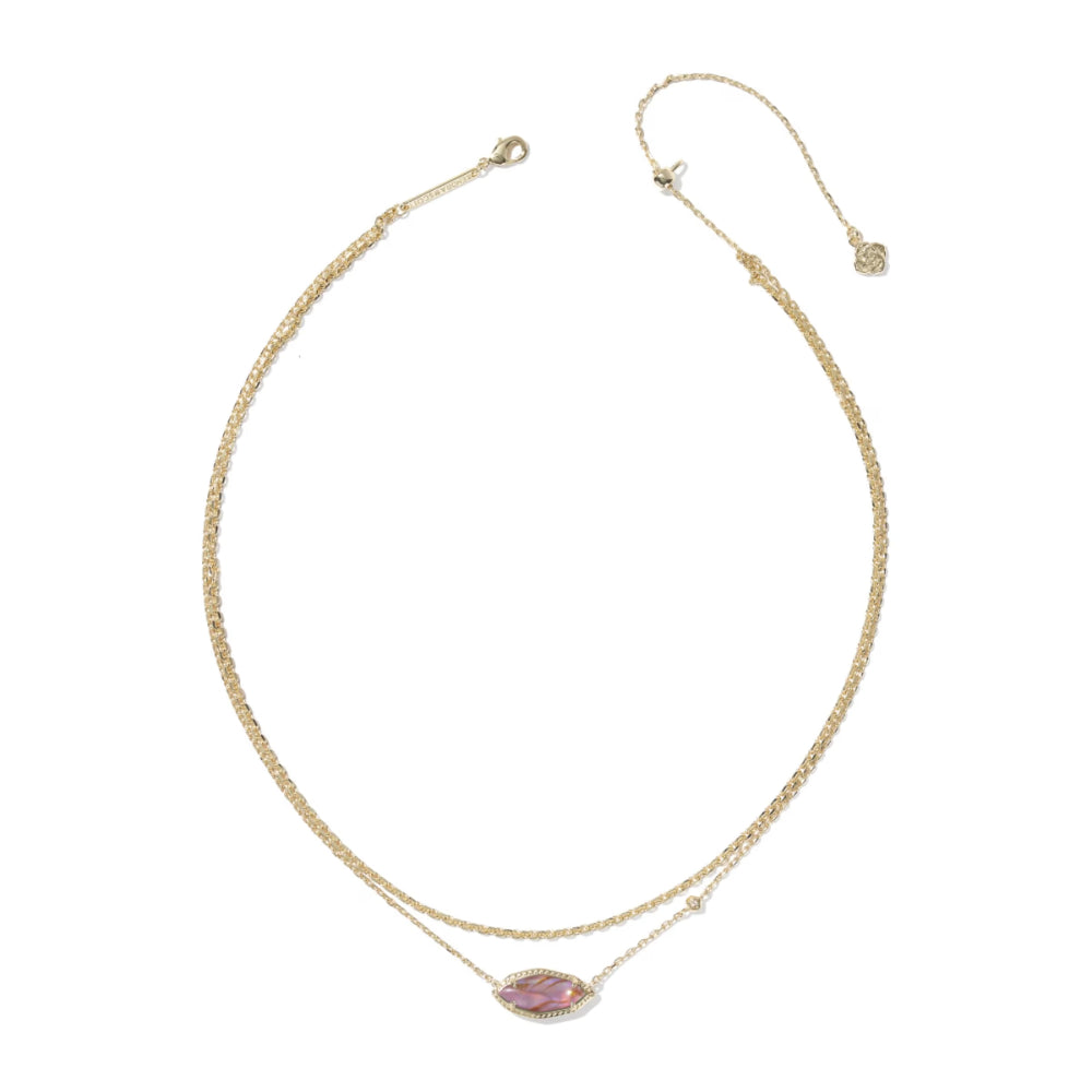 Gold necklace with a pink gemstone on a white background