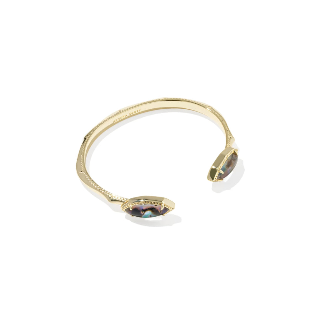 Gold bracelet with gemstones on a white background