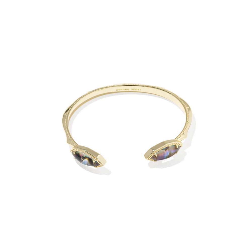 Gold bracelet with gemstones on a white background