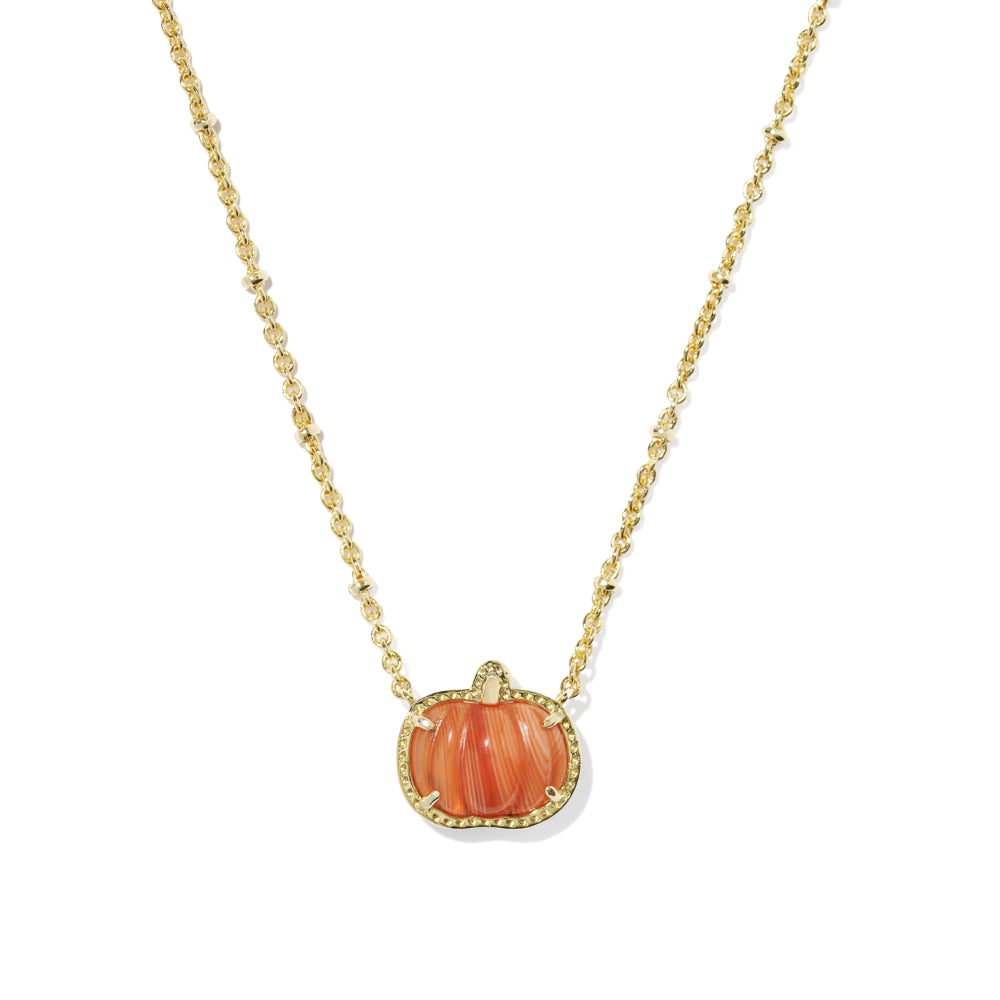 A gold chain necklace featuring a small pumpkin-shaped pendant with a carved orange-pink center and a border of tiny clear stones, shown on a plain white background.