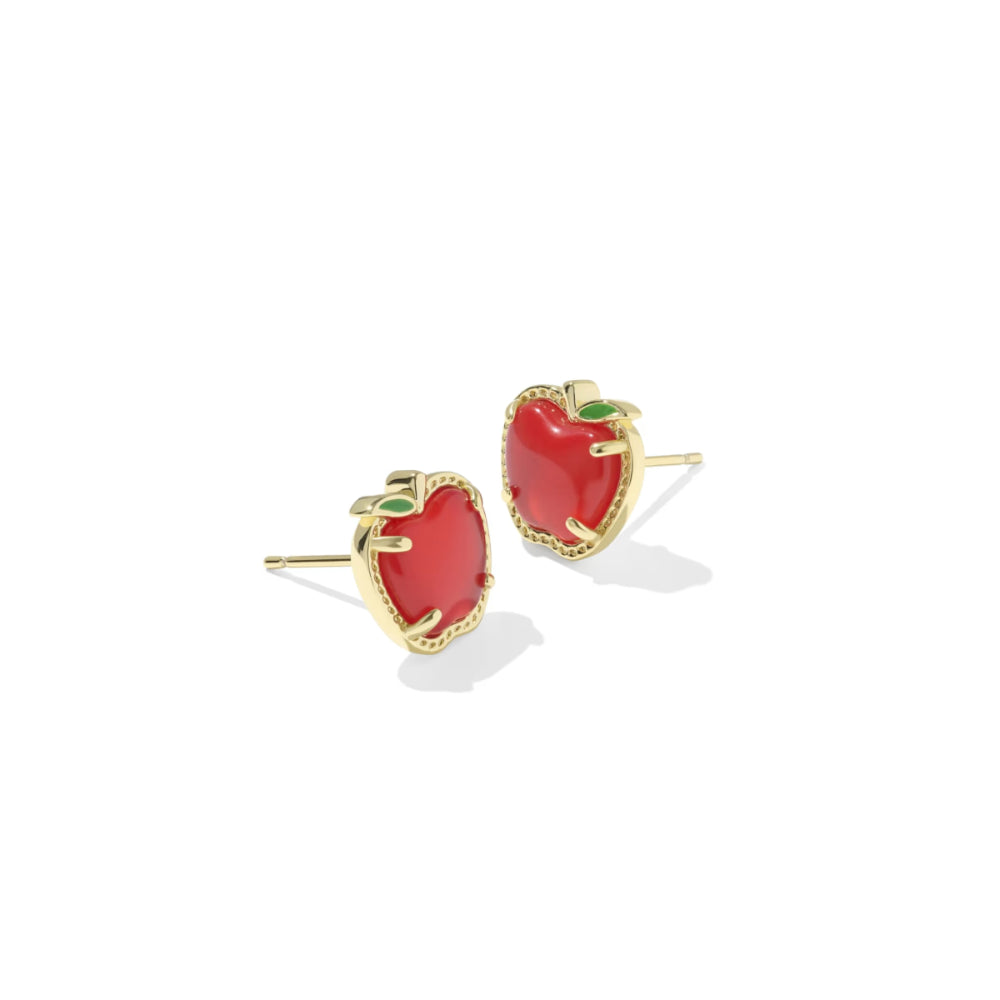 A pair of gold stud earrings featuring heart-shaped red enamel inlays with small green leaf accents at the top, shown on a clean white background.