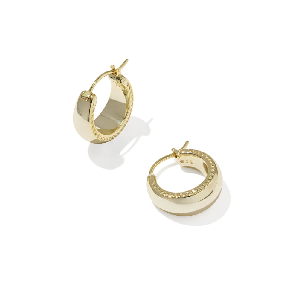 Gold hoop earrings on a white background