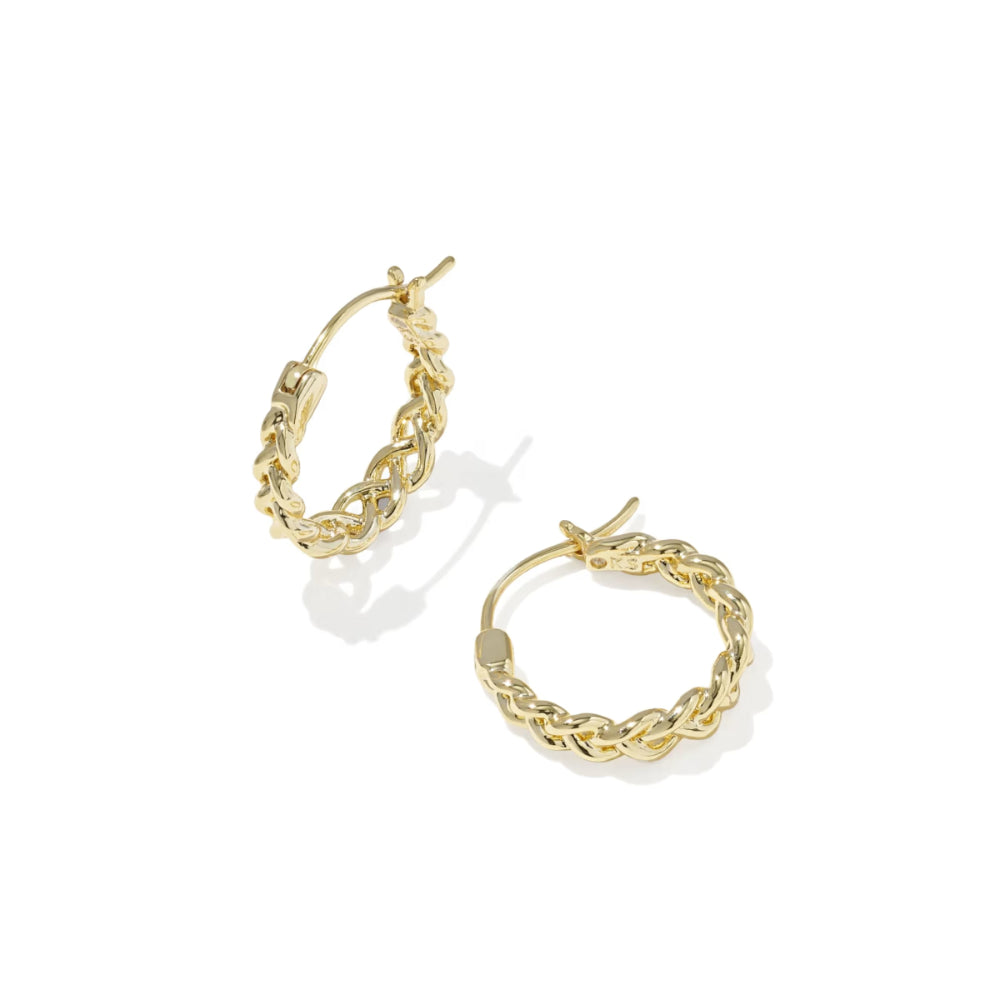 Gold hoop earrings on a white background