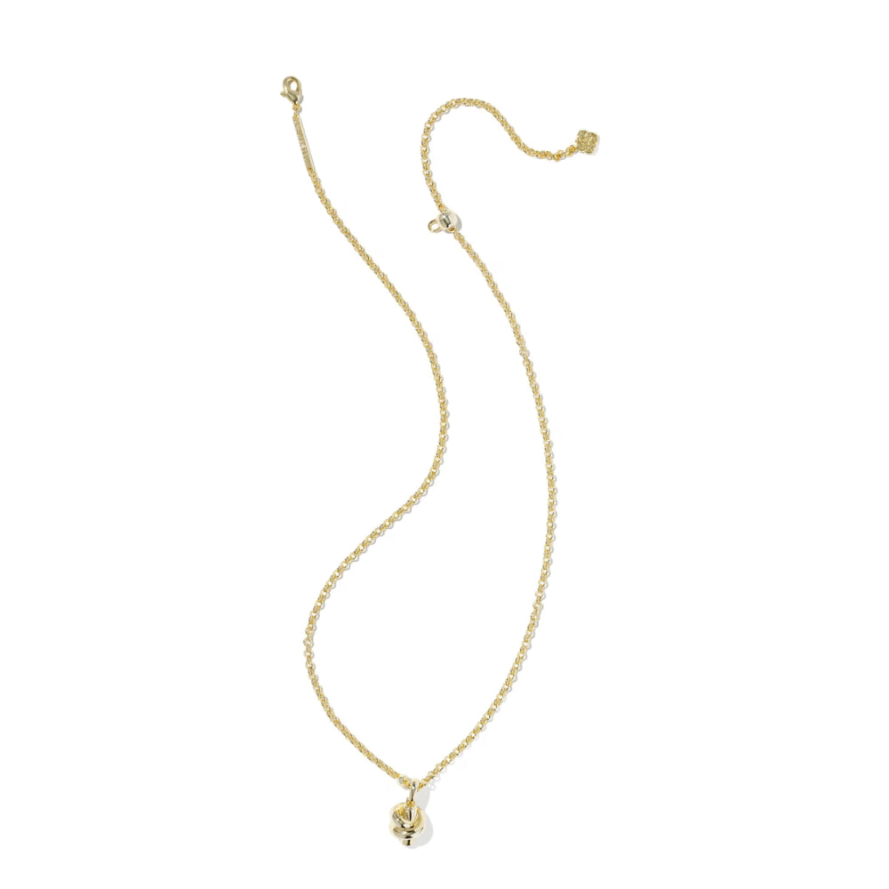 Gold necklace with a small pendant on a white background