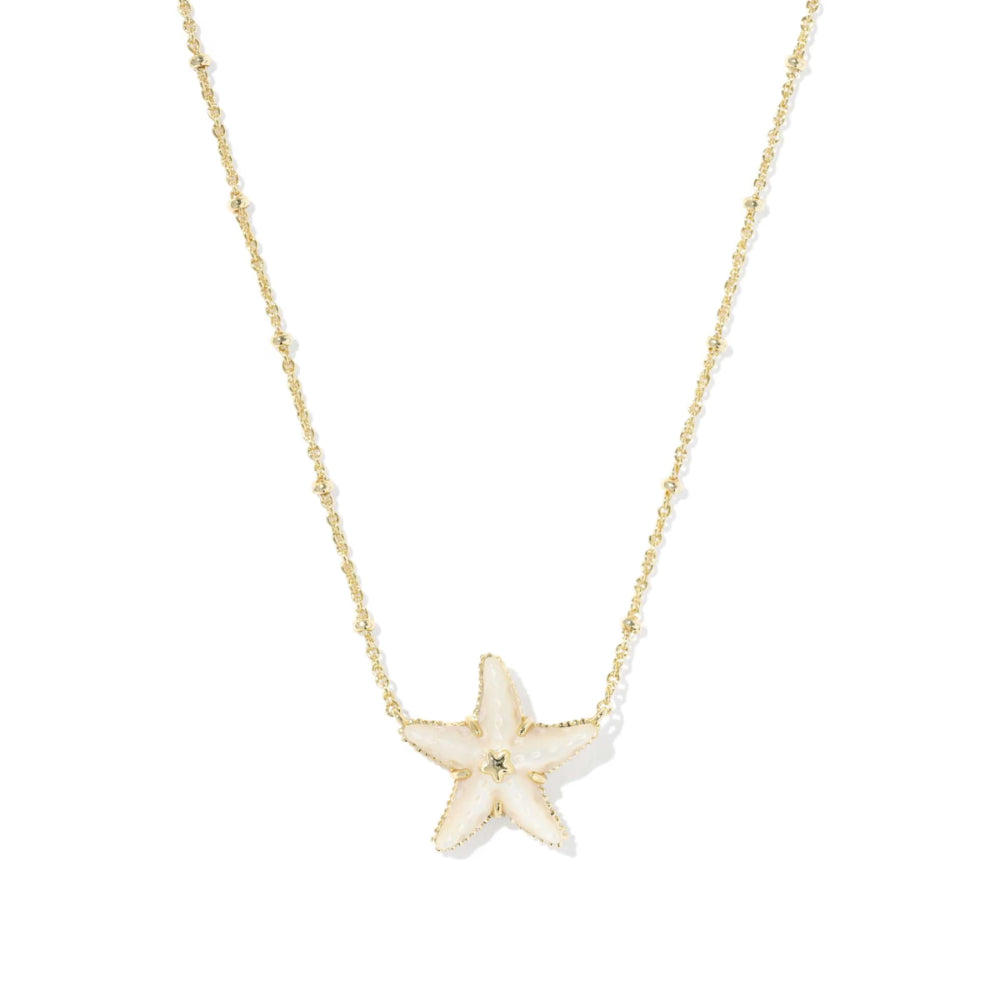 Starfish pendant necklace on a thin chain against a white background