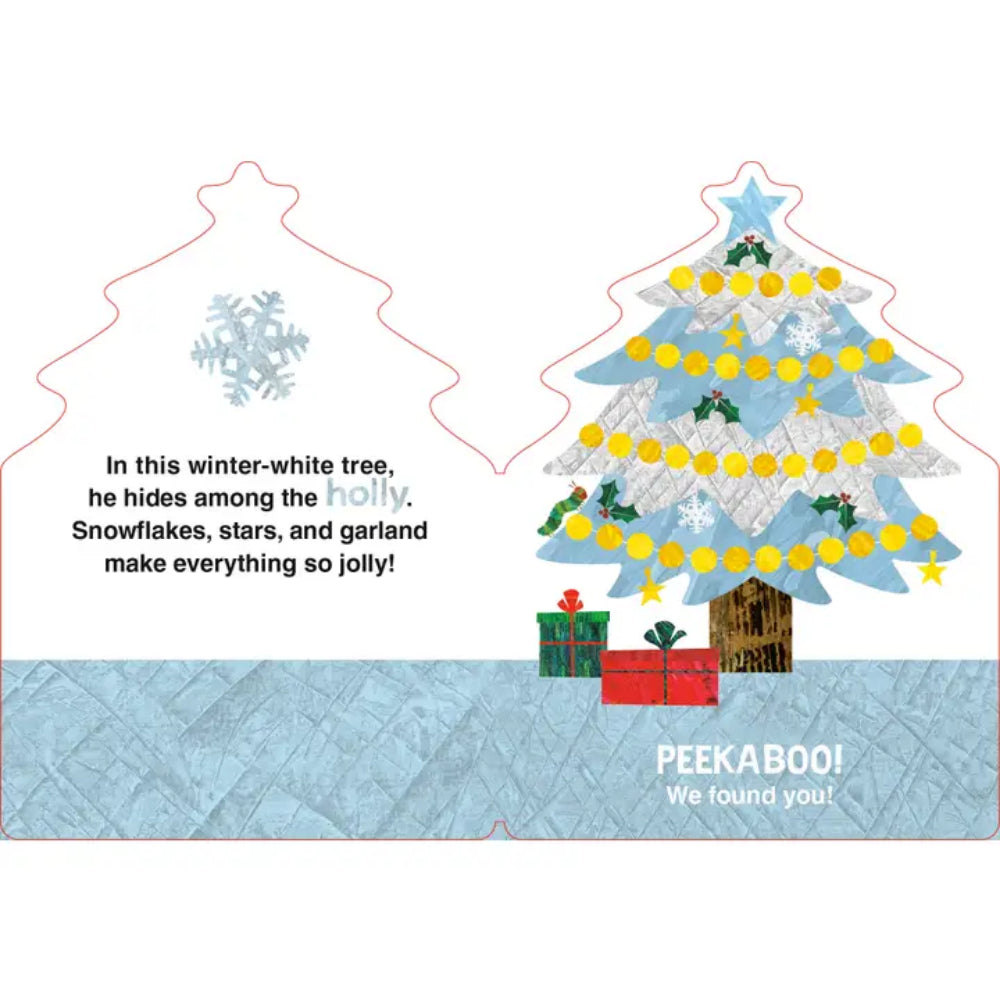 A festive Christmas peek-a-boo card with a white background and a stylized quilted winter tree on the right, decorated with blue panels, yellow garland, green holly, and red wrapped presents. The left side has a blank tree outline with a snowflake and text reading, 'In this winter-white tree, he hides among the holly.