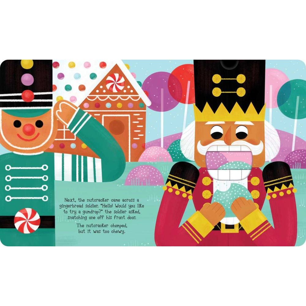 A colorful children's book or card-style illustration with a nutcracker holding a mug, a gingerbread house, candy canes, and a short text panel on a white page background.