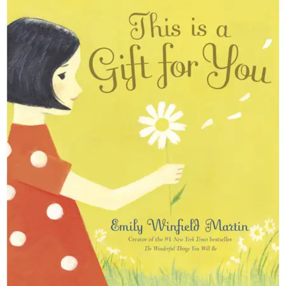 Yellow book cover with a girl holding a flower and text 'This is a Gift for You' by Emily Winfield Martin.