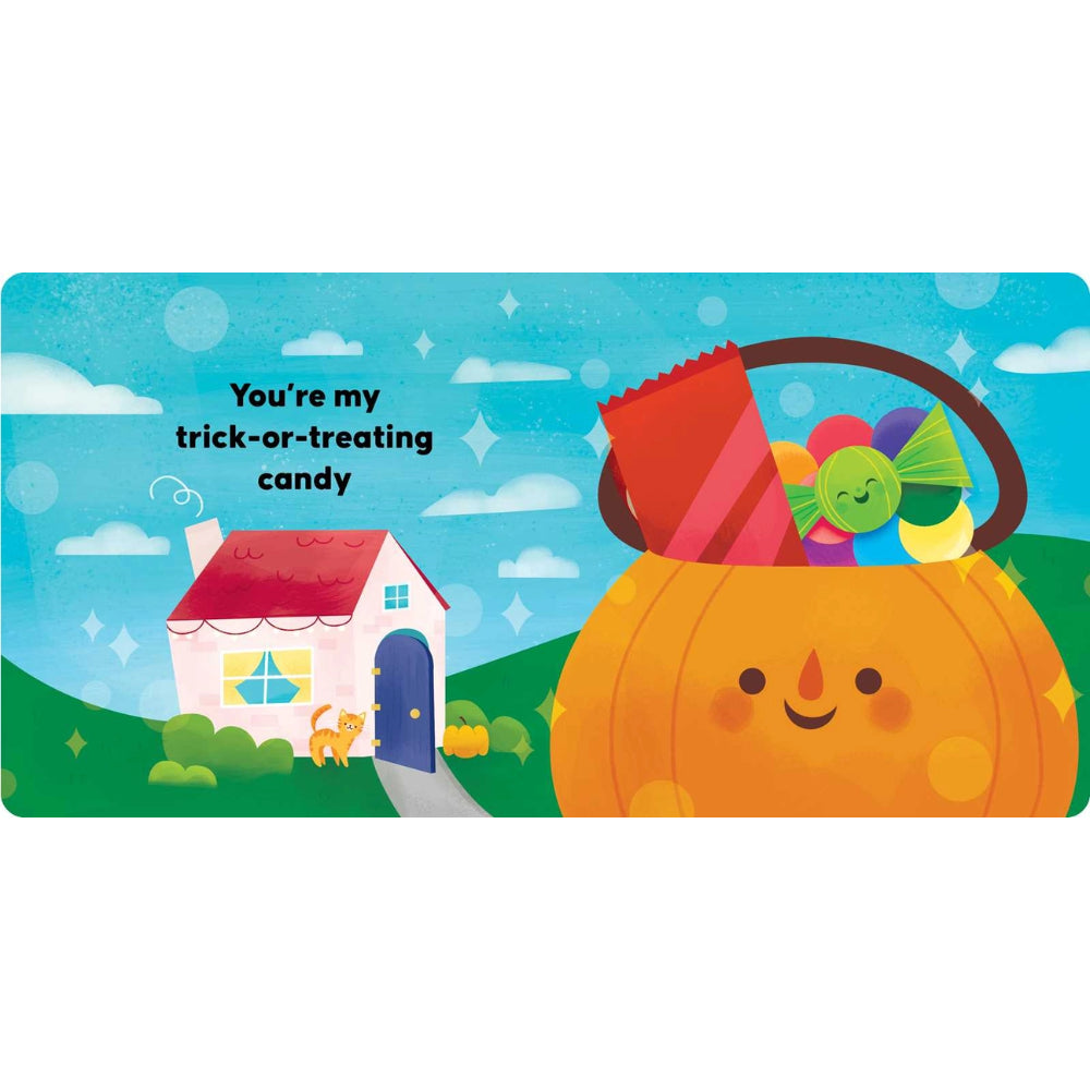 A colorful Halloween-themed card or print featuring a smiling orange jack-o'-lantern bucket filled with candy, a small house, clouds, and the text 'You're my trick-or-treating candy.'.