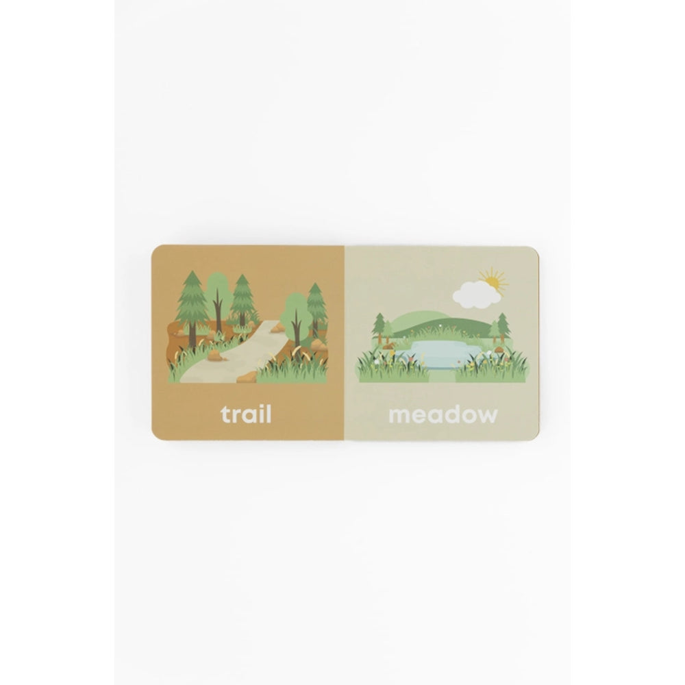 book with illustrations of a trail and a meadow on a beige background