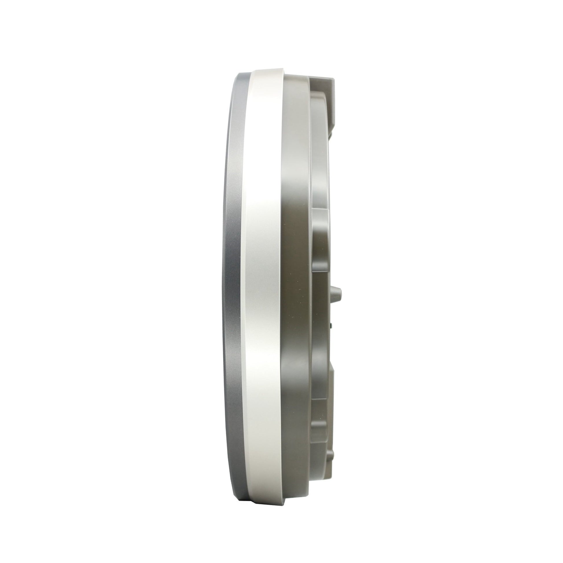 Metallic circular component on a white background