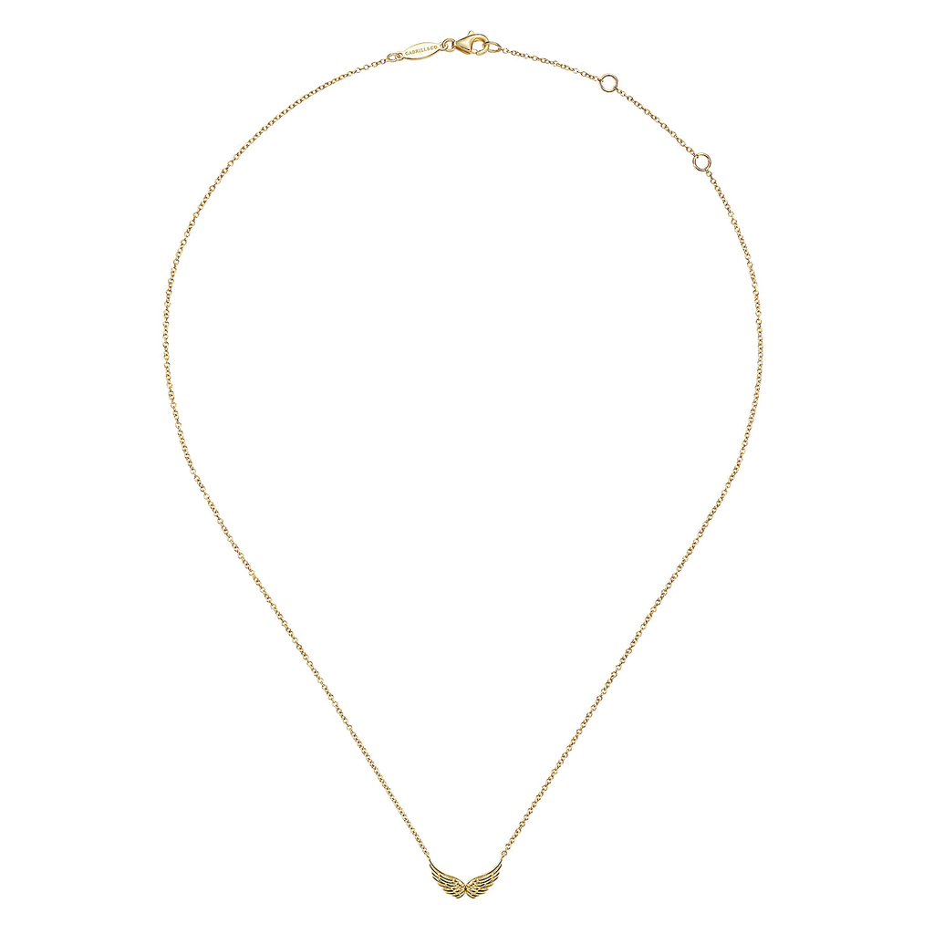 gold necklace with angel wings in the center on white background