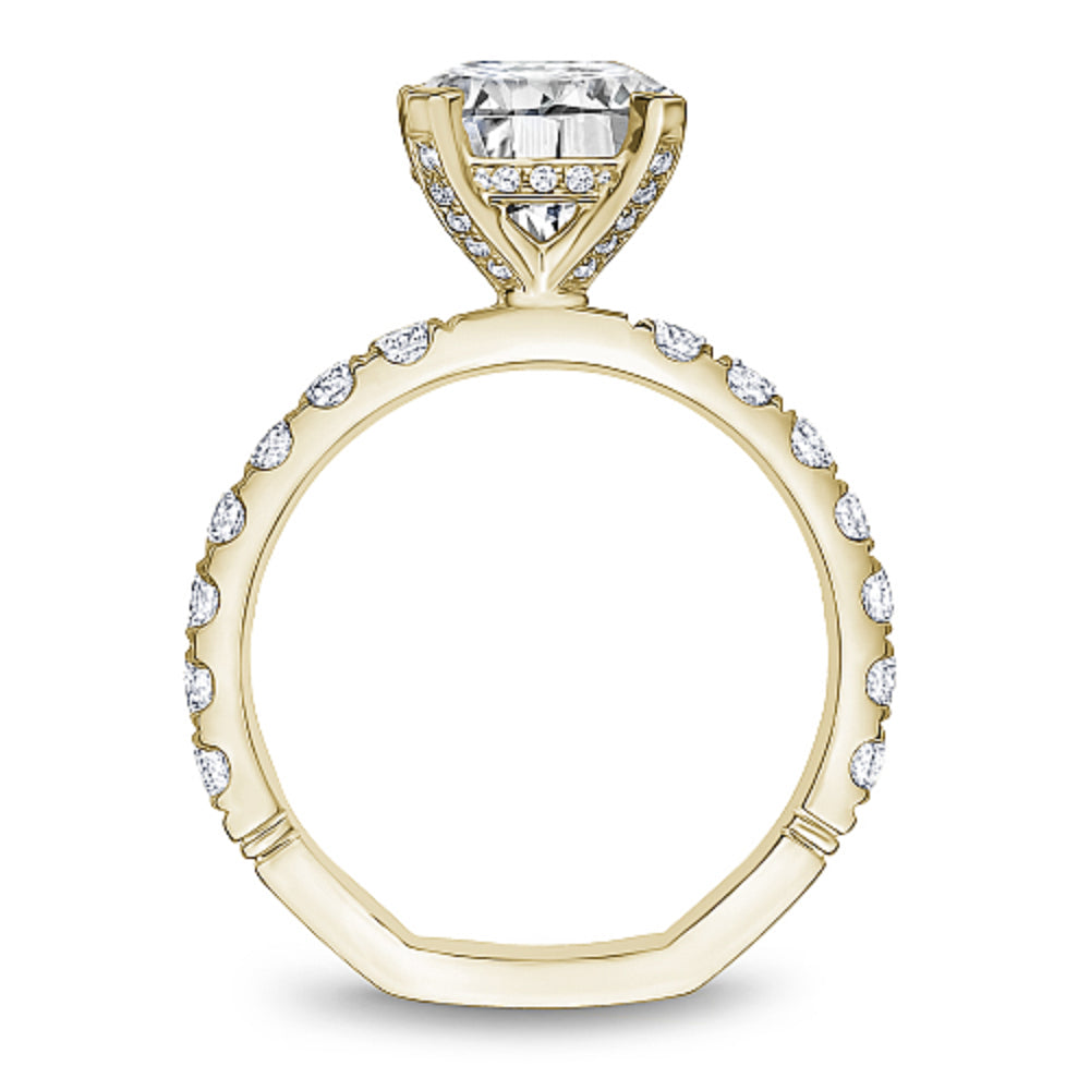 Yellow gold diamond ring with 'Noam Carver' branding on a white background
