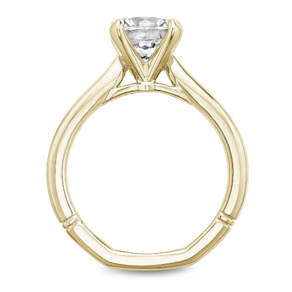 Yellow gold diamond ring with 'Noam Carver' branding on a white background