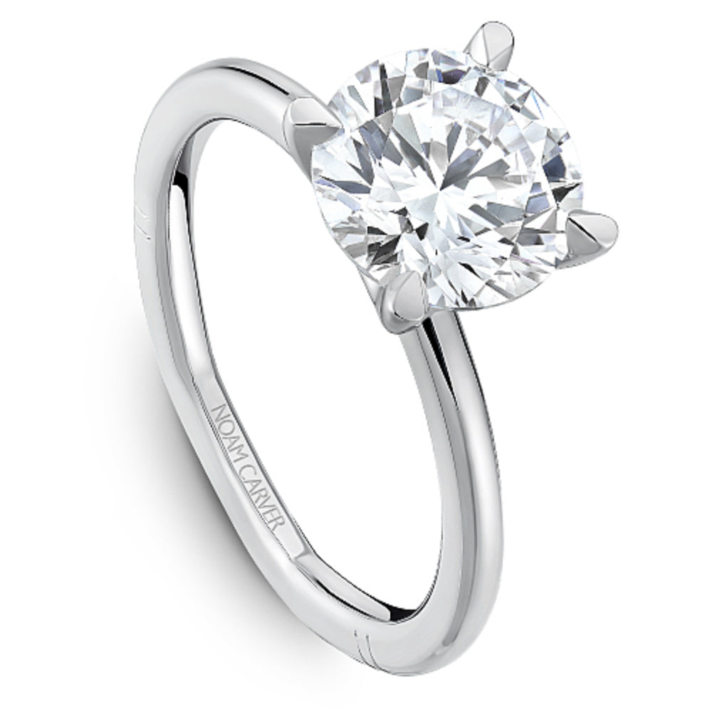 White gold ring with 'Noam Carver' branding on a white background