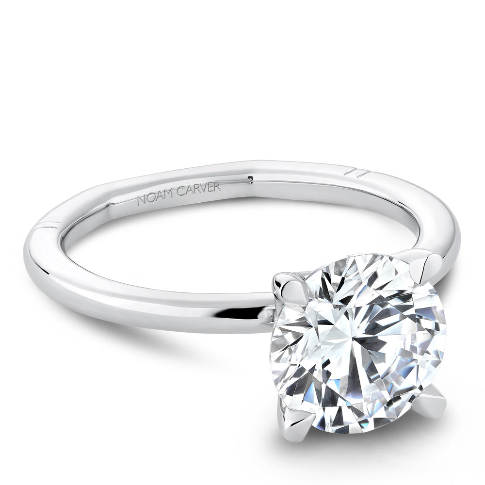 White gold ring with 'Noam Carver' branding on a white background