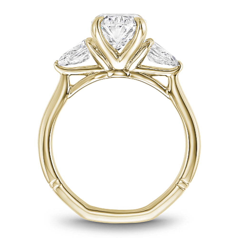 Gold Noam Carver ring with a large oval diamond center and two pear shape diamond sides on a white background