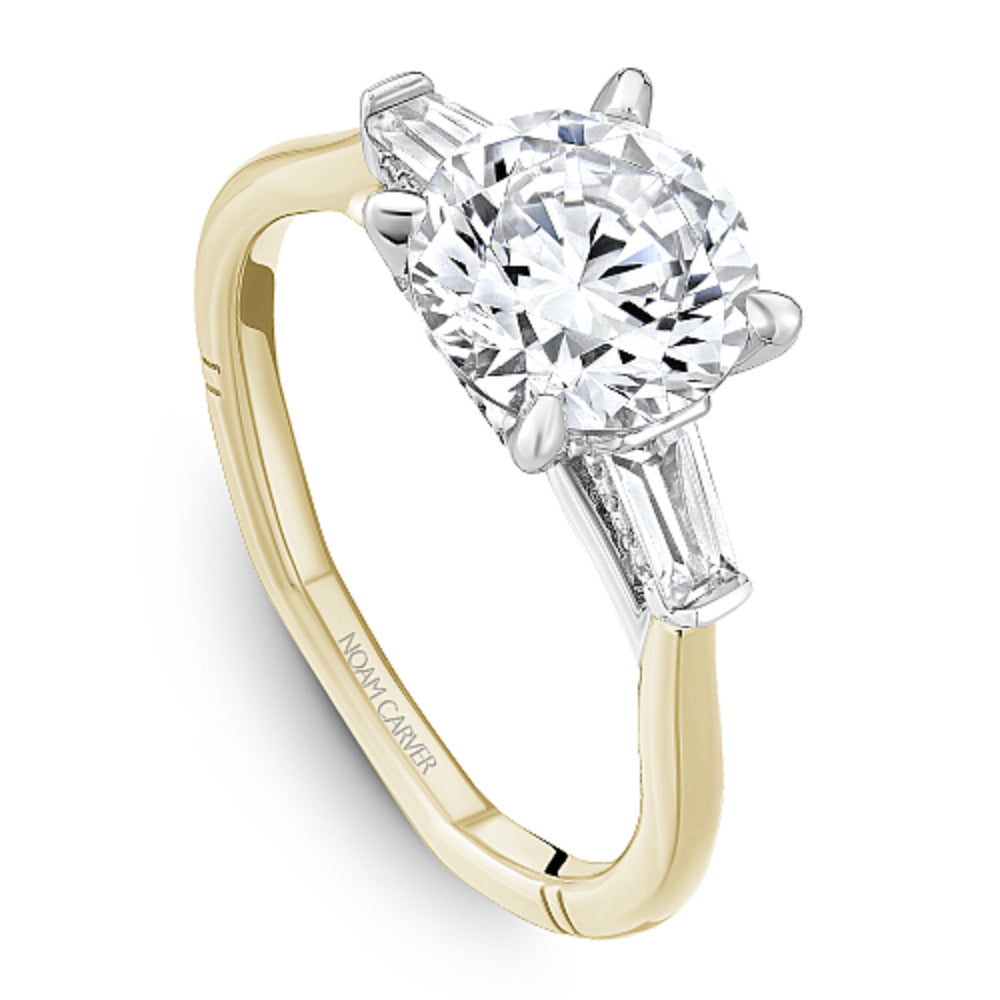 Two-tone gold diamond ring with 'Noam Carver' branding on a white background