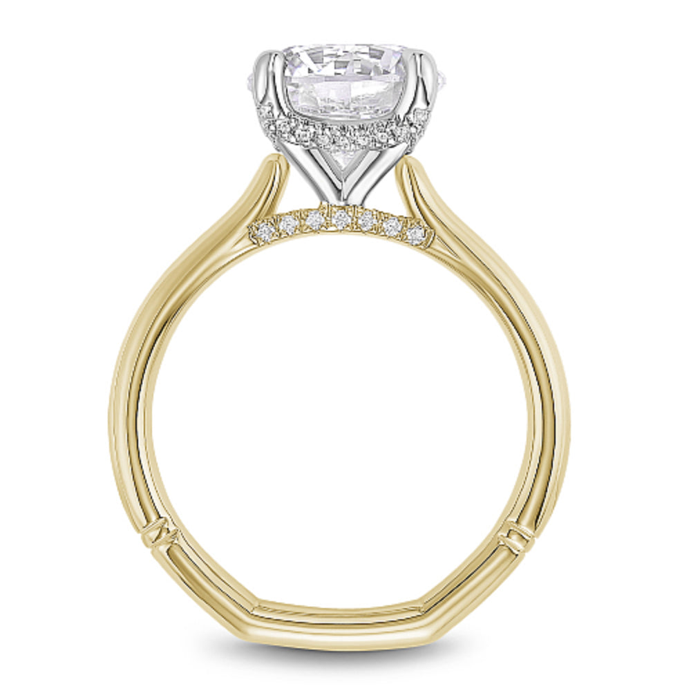 Diamond ring with 'Noam Carver' branding on a white background
