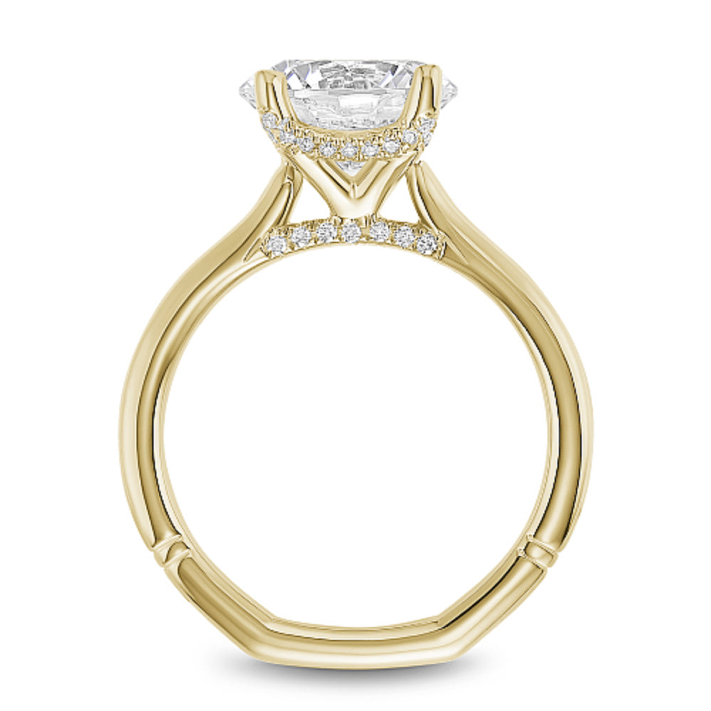 Gold Noam Carver ring with a large round diamond center on a white background