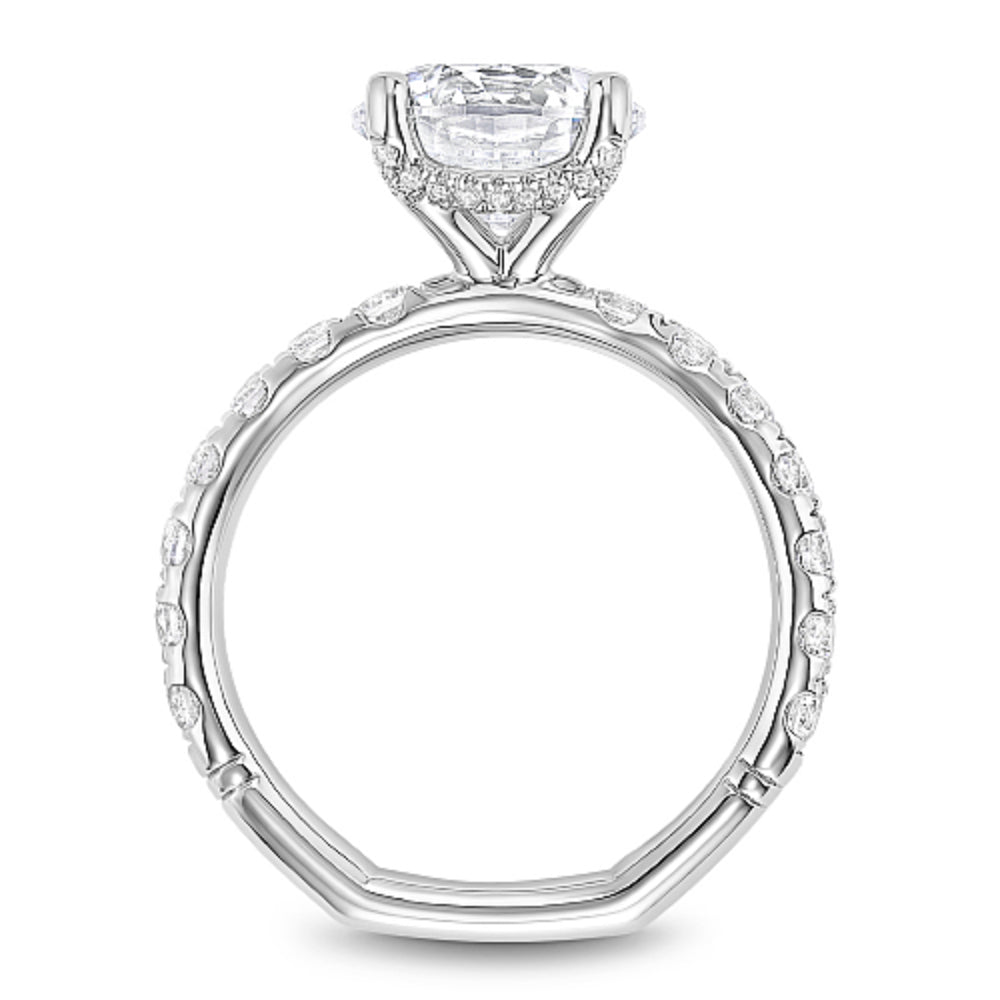 Diamond ring with 'Noam Carver' branding on a white background