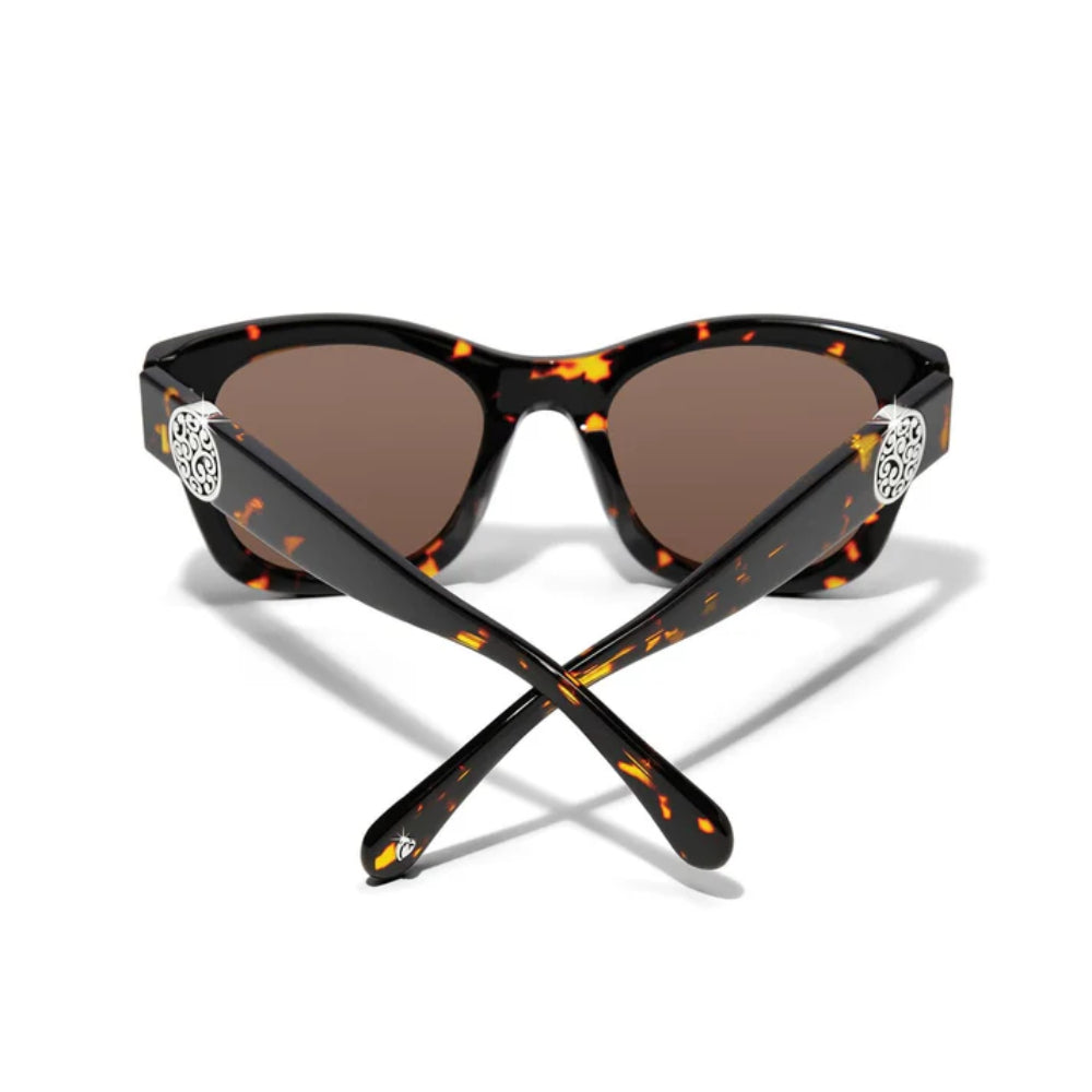 Tortoiseshell sunglasses with decorative arms on a white background