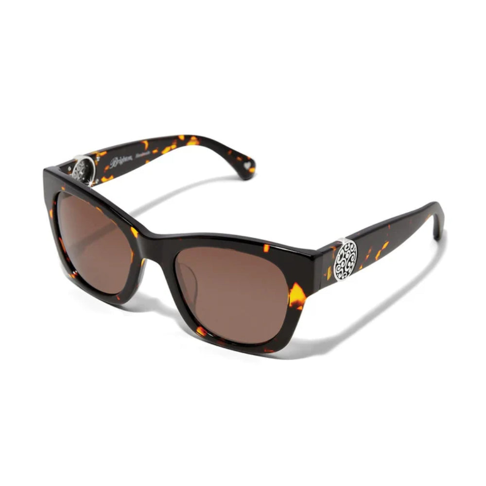 Sunglasses with tortoiseshell frame and brown lenses on a white background