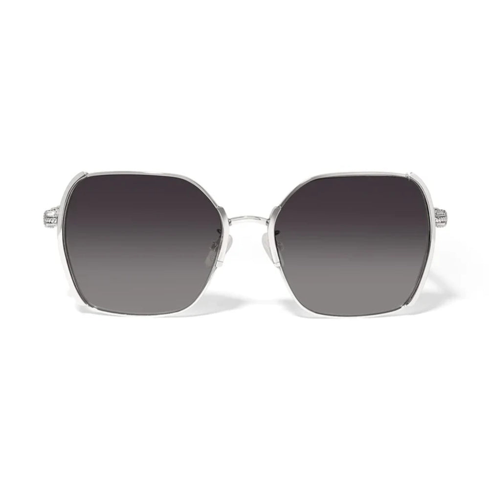 Sunglasses with a silver frame and dark lenses on a white background