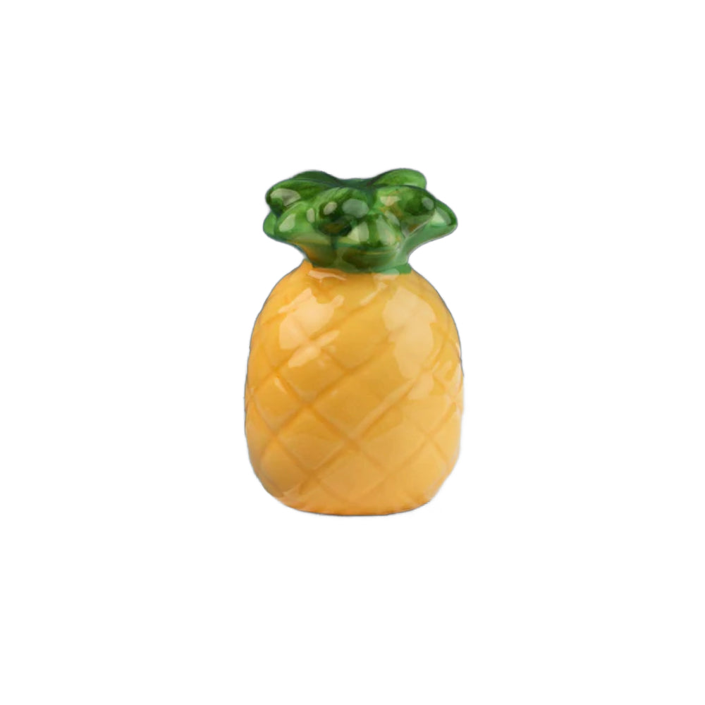 Pineapple-shaped mini decor on a white background