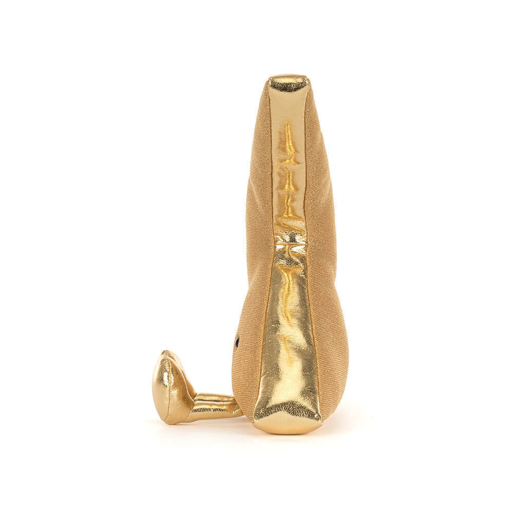 A side photo of a gold lightning bolt-shaped figurine plush toy with a smiling face and gold legs on a white background.