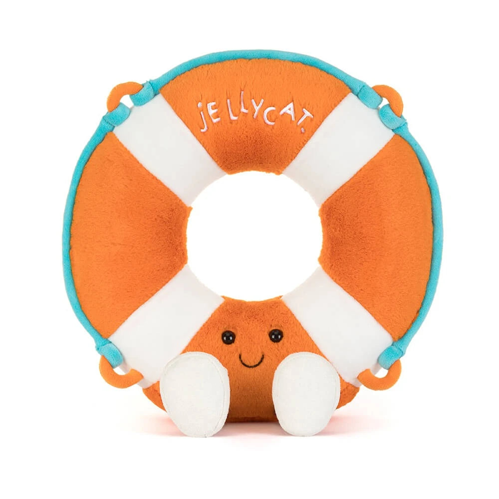 A front facing photo of a plush toy of a orange & white striped life ring that says "Jellycat" in white letters with a face and brown legs with white sandles on a white backround.