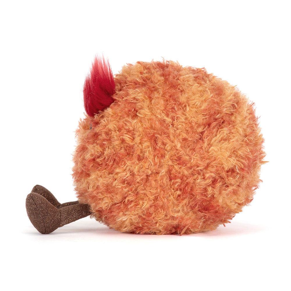 Left side photo of jellycat amuseables planet marsplush toy with red hair and a sad expression on a white background