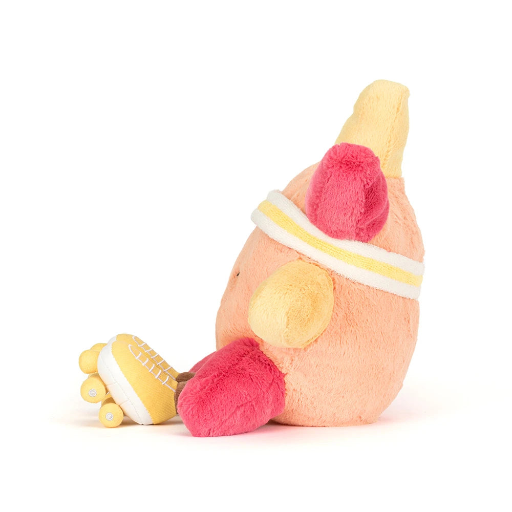 An side photo of a sun themed plush toy, with roller skates in orange, pink and  yellow, with a white and yellow headband with yellow and white skates and brown legs on a white background